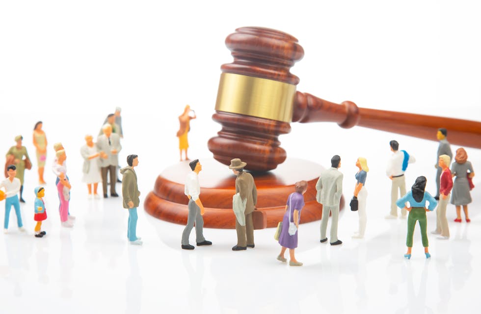 Miniature,People.,Many,People,Near,The,Gavel,Of,Law,And